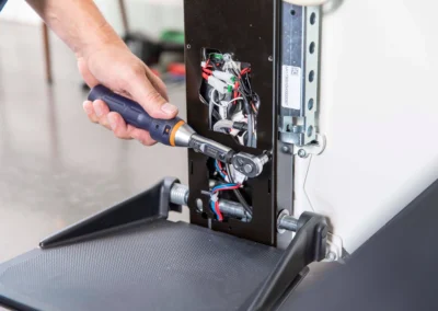 Handicare stairlift technician repairing lift in Bath, South West England