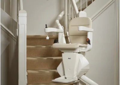 Hands On Stairlifts curved stairlift in use in a South Wales home