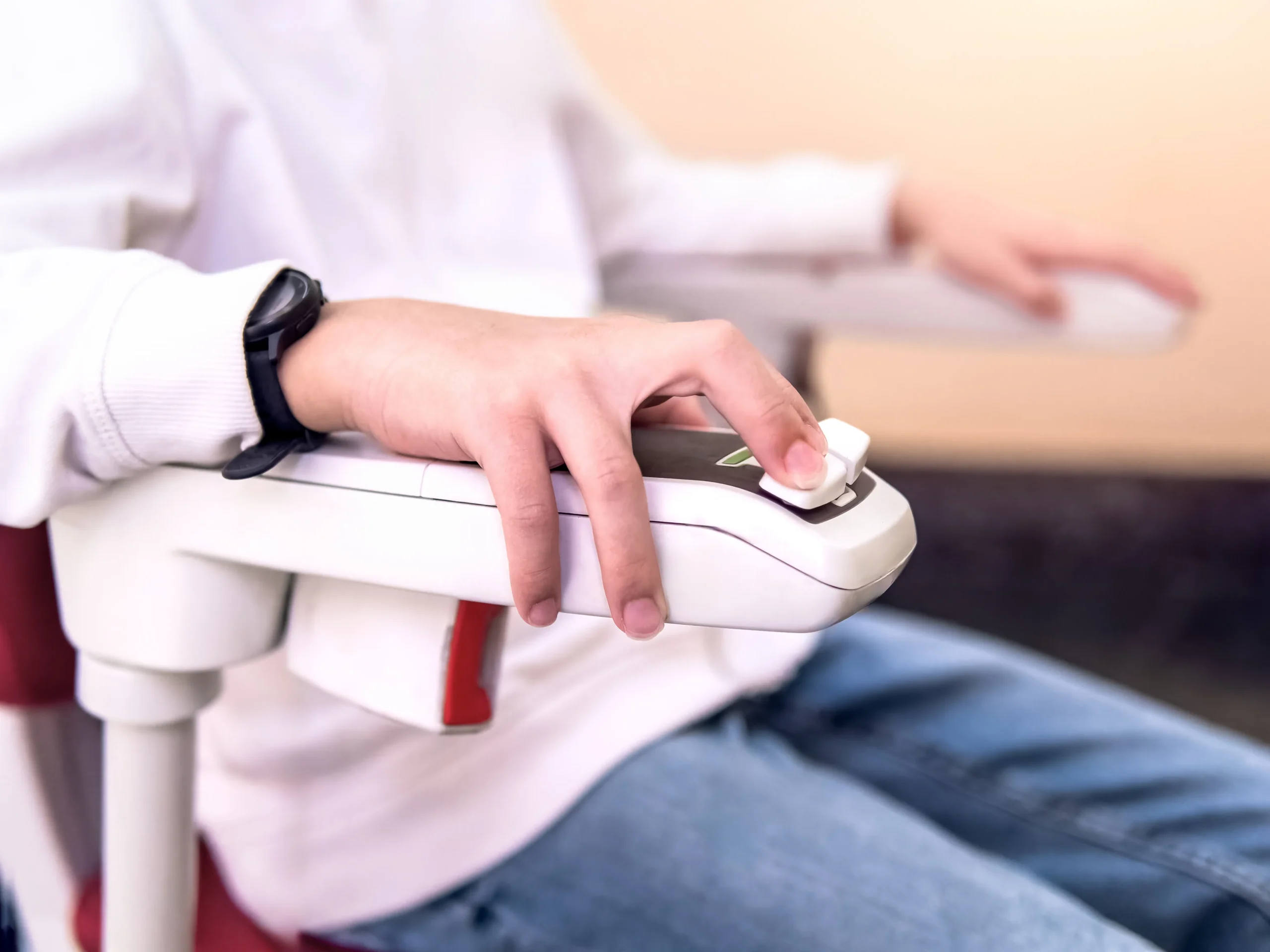 Stairlift being controlled by grandparent in Shepton Mallet home